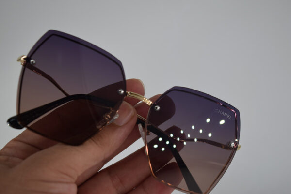عینک آفتابی چند ضلعی دسته طلایی برند چنل زنانه کد 408428