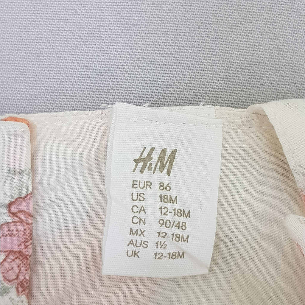 سارافون زیردکمه دار 23089 سایز 9 ماه تا 4 سال مارک H&M